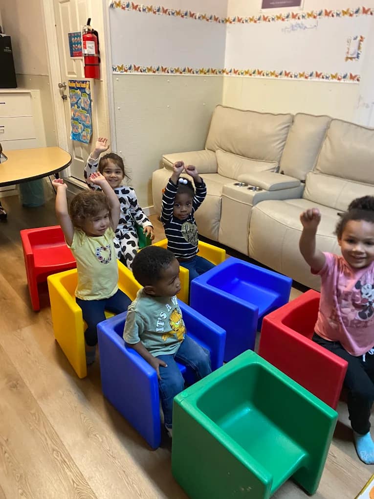 Kids sharing a book during story time.