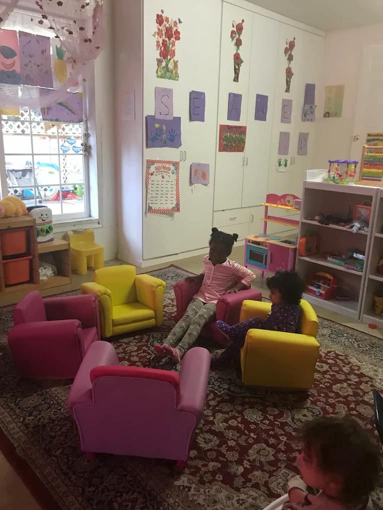 Children relaxing on mats for story time.